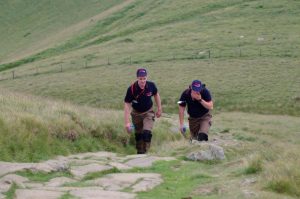 RRT marshalls climbing to Lose Hill Checkpoint