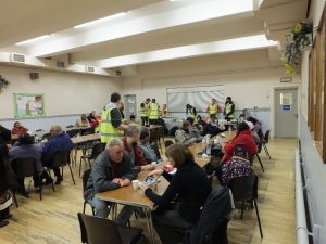 Some of the evacuated residents at Belgrave Community Centre enjoying the refreshments